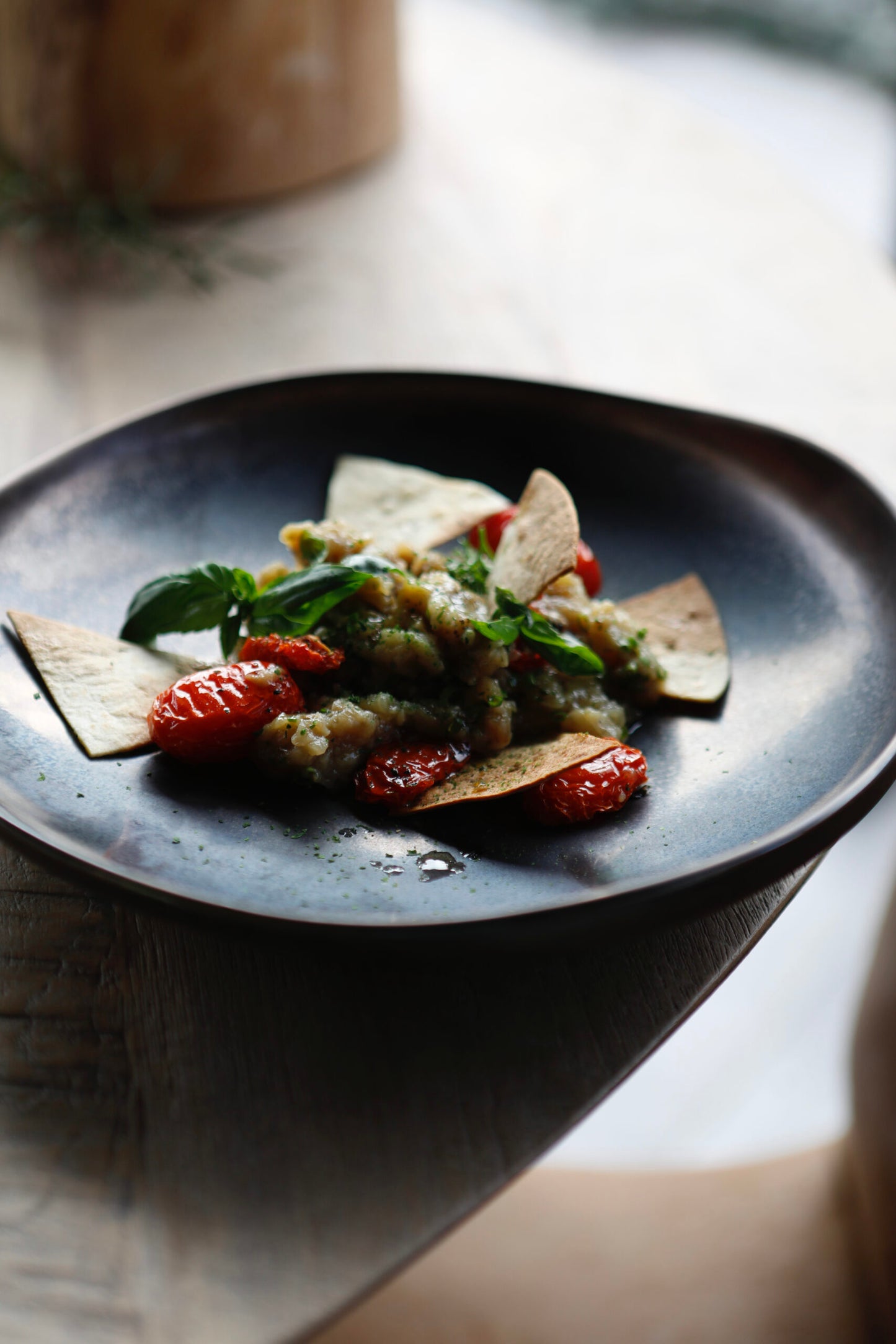 Smoked aubergine, confit cherry tomatoes, Sardinian guttiau carasau bread