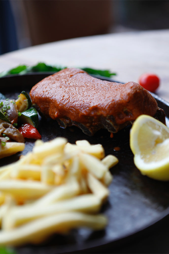 Slow cooker BBQ lime marinated pork ribs, crispy potatoes, wok vegetables