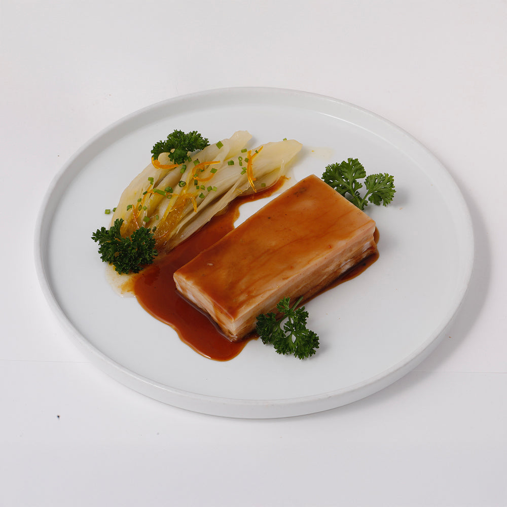 Low temperature segovia piglet, citrus endive, demiglace