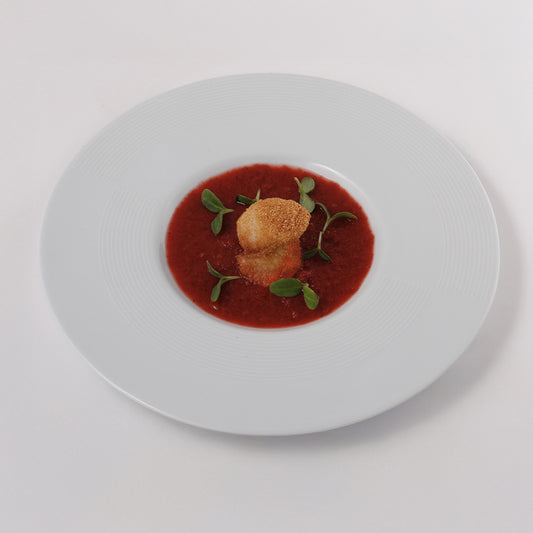 Strawberry and Cava sorbet, seared scallops, mint leaves