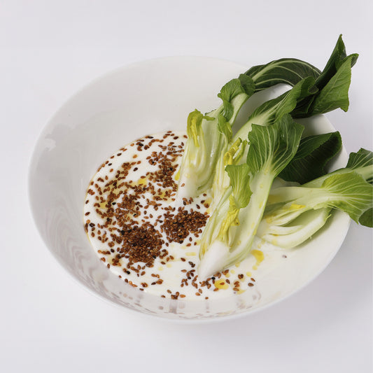 Pak-choi, ginger yogurt, sesame seeds