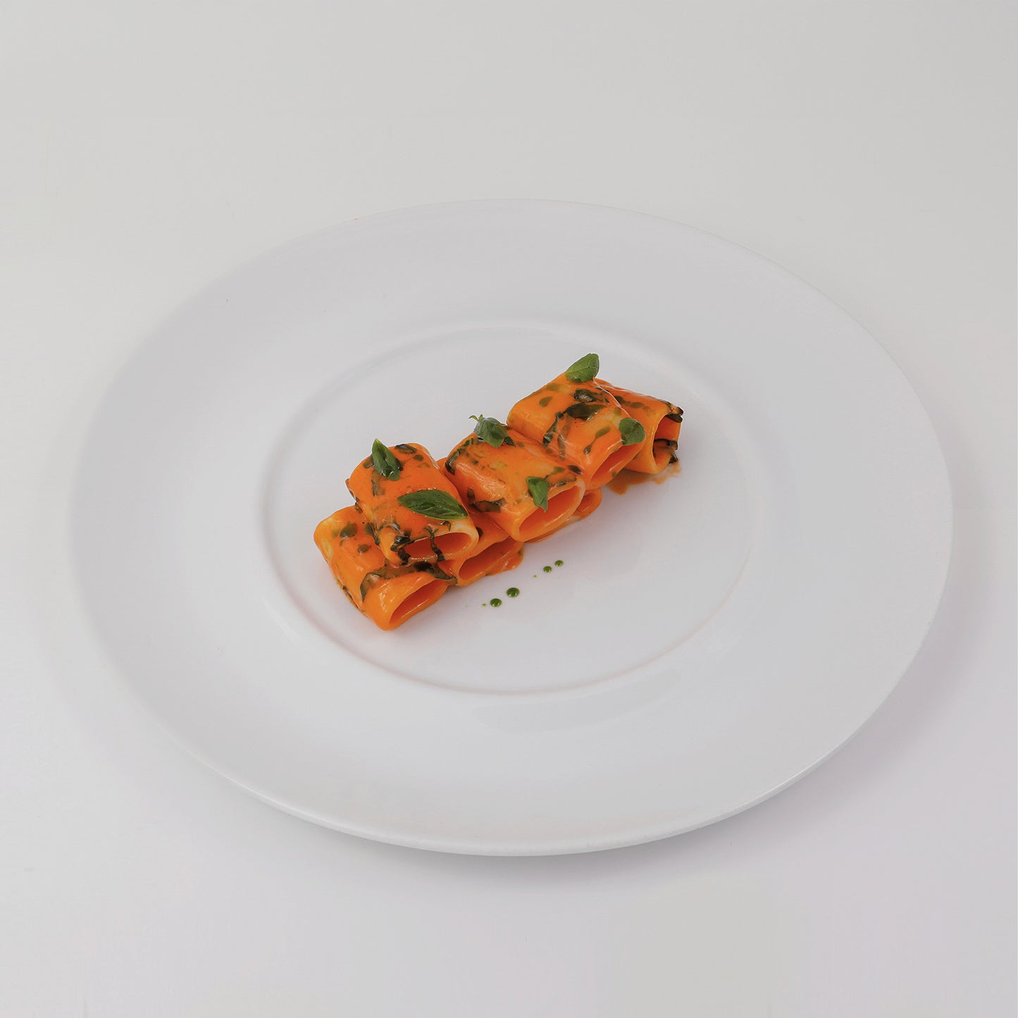 Paccheri with traditional Italian confit tomato sauce, smoked butter, fresh basil, parmesan