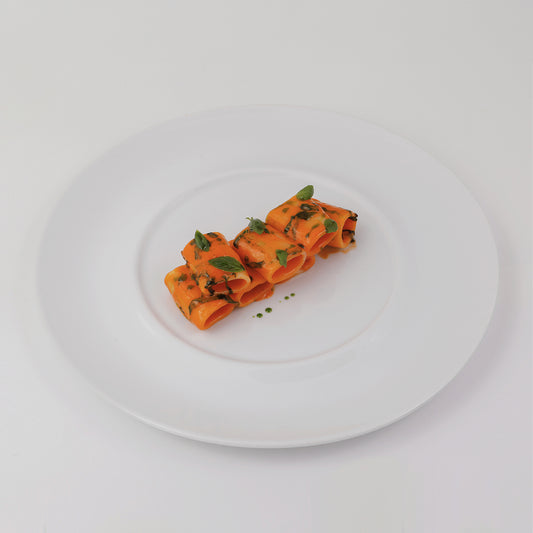 Paccheri with traditional Italian confit tomato sauce, smoked butter, fresh basil, parmesan