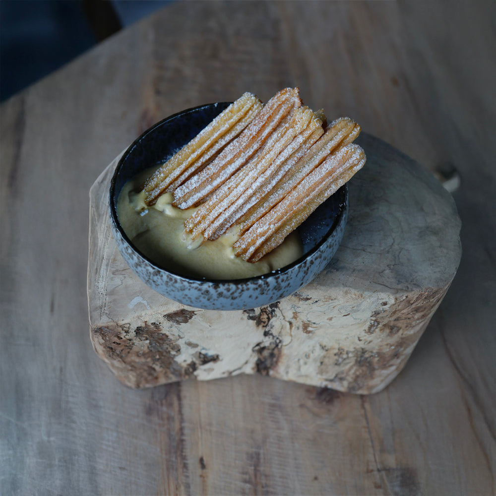 Churros, hierbas, custard cream, rosemary
