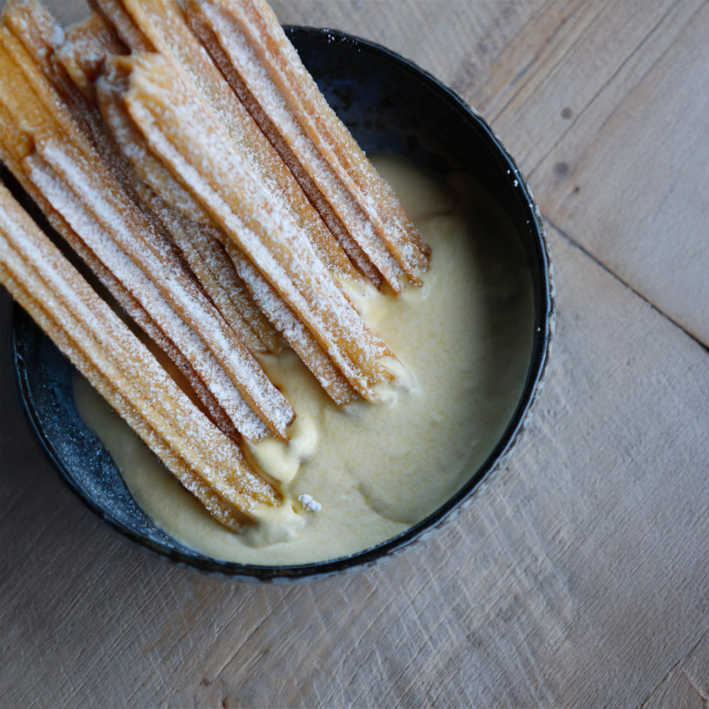 Churros, hierbas, custard cream, rosemary