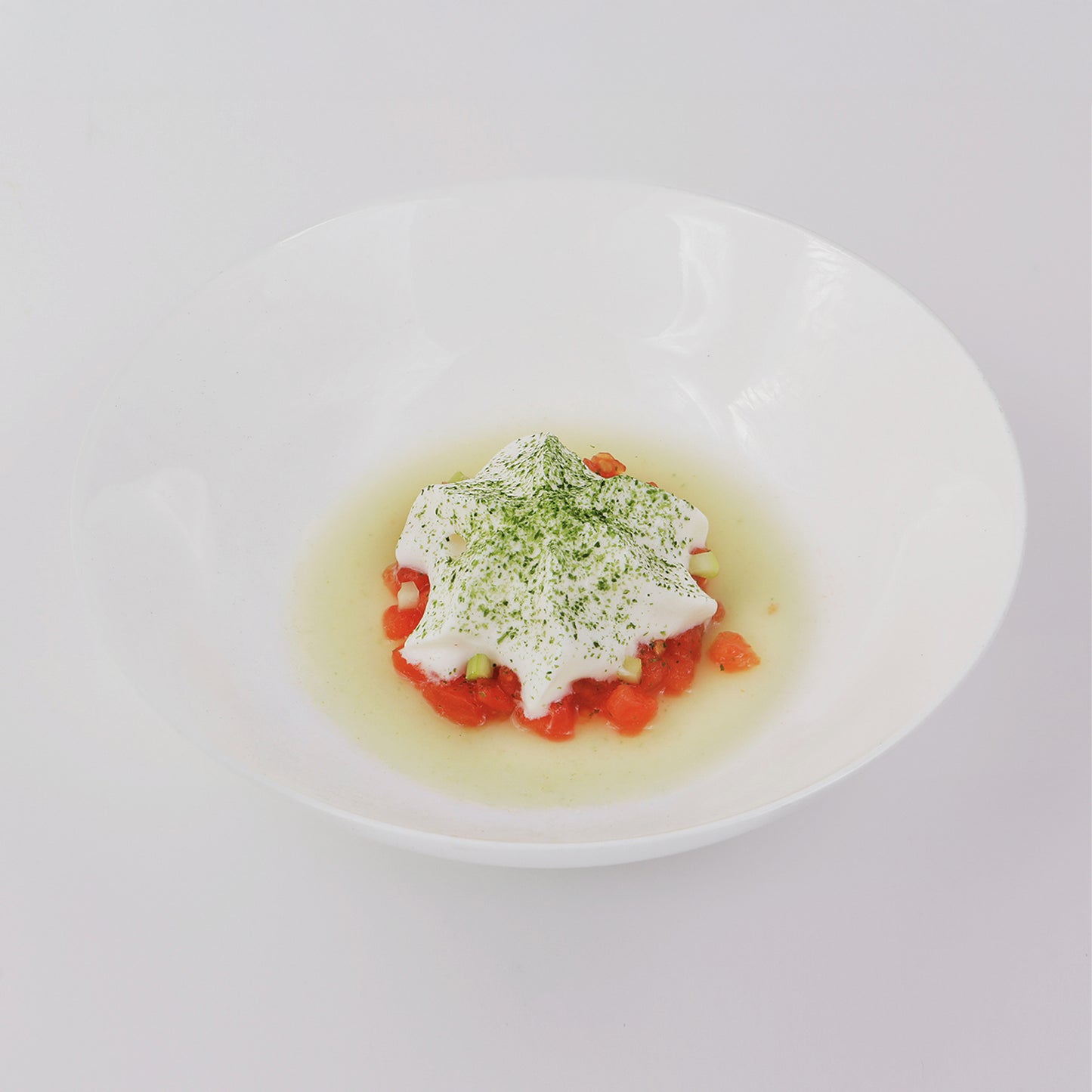 Mixed tomatoes Concassè , fresh cucumber juice, local buffalo mozzarella foam and Nori seaweed powder