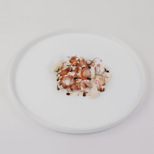 Seabass carpaccio, white gazpacho from Malaga, coffee gel