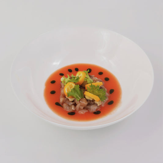 Blackish carpaccio, tomato and watermelon gazpacho, dehidrated kumquat