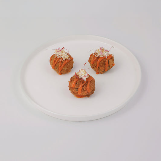 Aubergine croquettes with datterino tomato emulsion and smoked ricotta