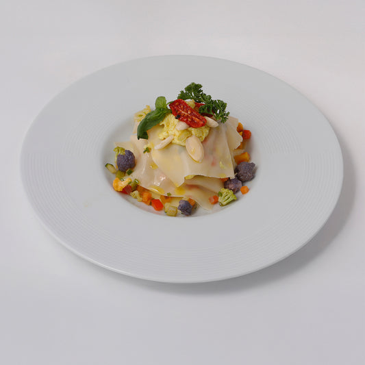 “Lasasagnetta” the baby lasagna, texturized soy Bolognese, vegetables ratatouille, turmeric béchamel